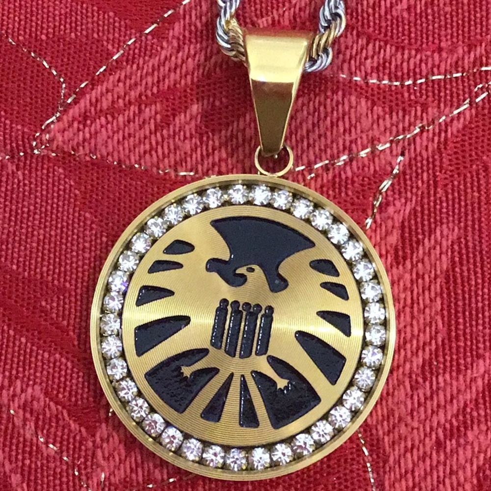 American Eagle Pendant Gold Stainless Steel w/ Rhinestones on the Outer Edge.